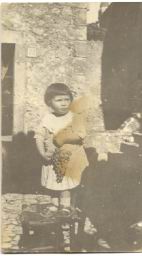 Same infant as the one on Pellegrino's lap